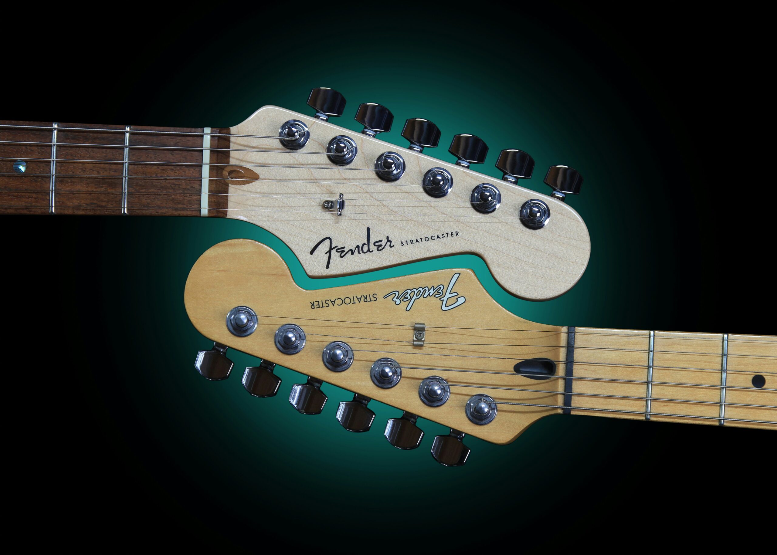 two Fender Stratocaster headstocks